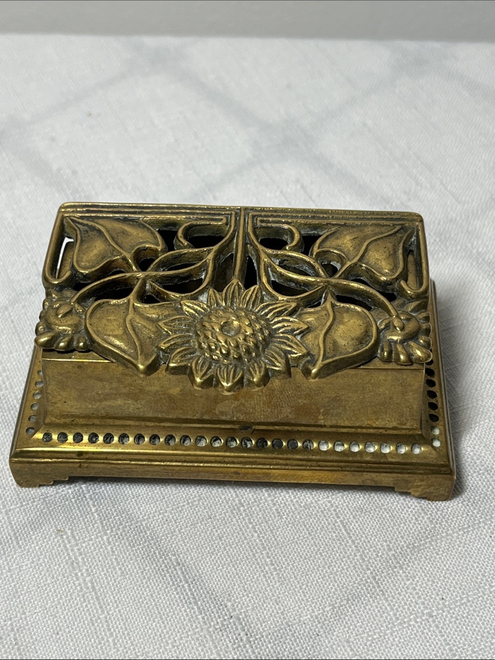 Vintage brass desk accessory 
Art Nouveau double-roll postage stamp holder
